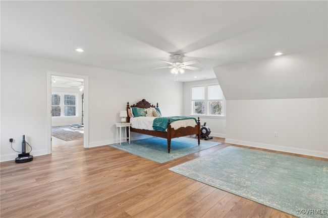 Bedroom with recessed lighting, baseboards, light wood-style floors, and ceiling fan | Image 35