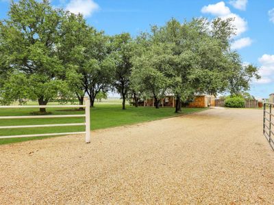 This one-of-a-kind, updated 3-bedroom, 2-bathroom home sits on over 5 breathtaking acres, offering the perfect blend of space, style, and serenity. | Image 1