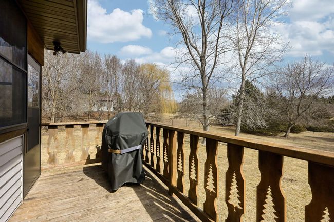 Deck off the 3-season is perfect for a grill | Image 21