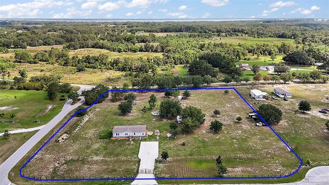 8507 Strawberry Fields Ct, House other with 4 bedrooms, 2 bathrooms and null parking in HOWEY IN THE HILLS FL | Image 4