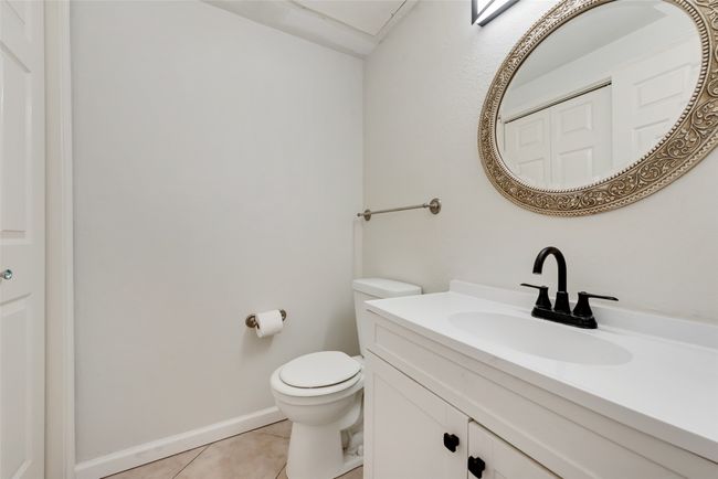 1st floor Half bath with tile patterned flooring and vanity | Image 11