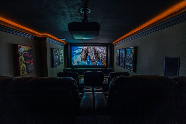 Cinema with 4K projector, 120&quot; screen, surround sound, insulated walls, theater seating for seven and bar seating for three more (10 total) and popcorn/candy room. | Image 31
