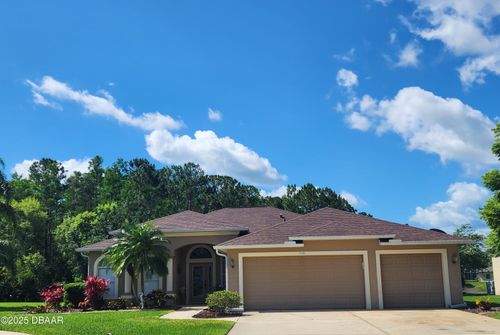 704 Saw Palmetto Ct, Port Orange, FL, 32128-4073 | Card Image