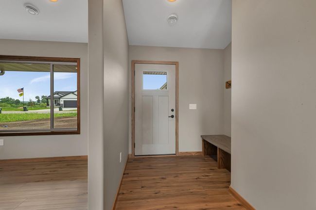 Front entry with bench and closet | Image 8