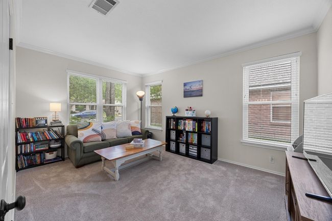 Flex space currently being used as additional family/game/craft space. | Image 8