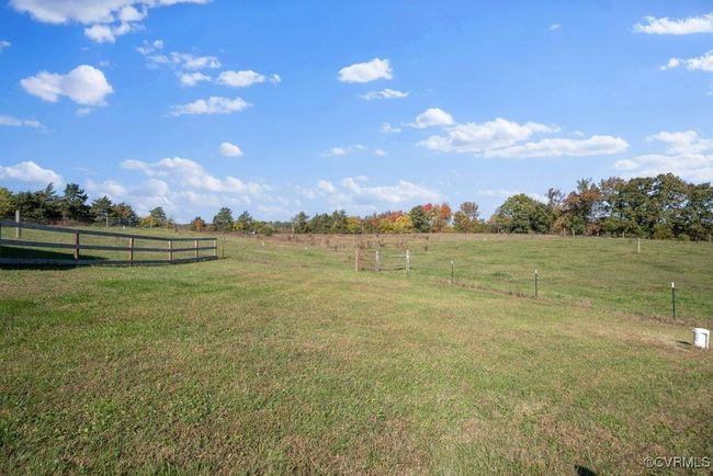 View of yard with fence and a rural view | Image 38