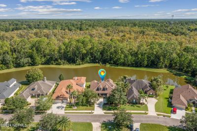 Lake front and wooded preserve behind the home | Image 2