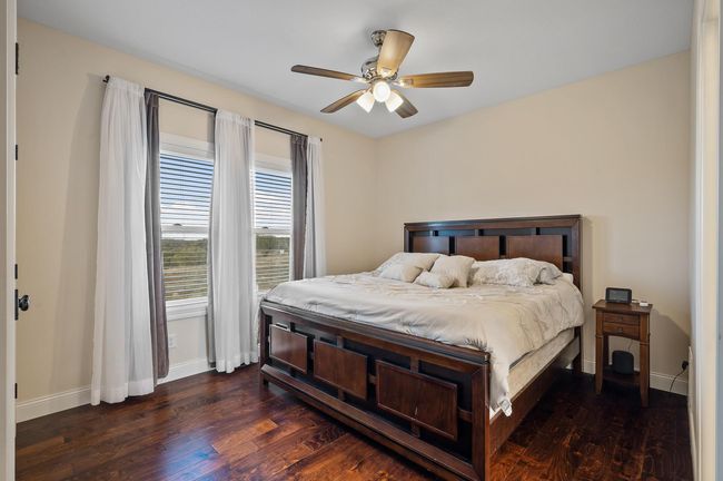 Two spacious bedrooms on the upper level share a Jack-and-Jill bathroom. | Image 21