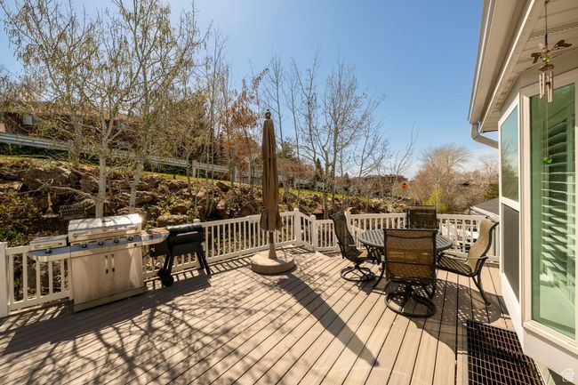Wooden deck with outdoor dining area | Image 8