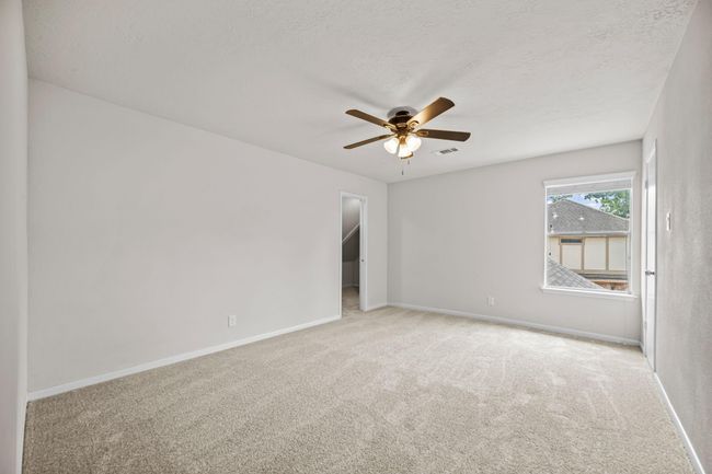 Upstairs bedroom 3 overlooks the back yard | Image 26
