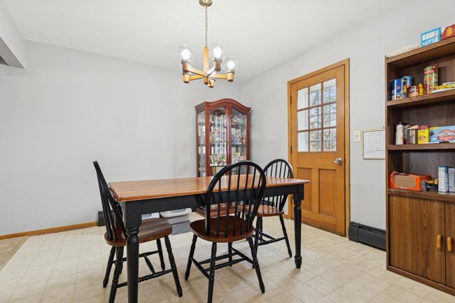 The dining room door leads to the spacious deck and back yard! | Image 4