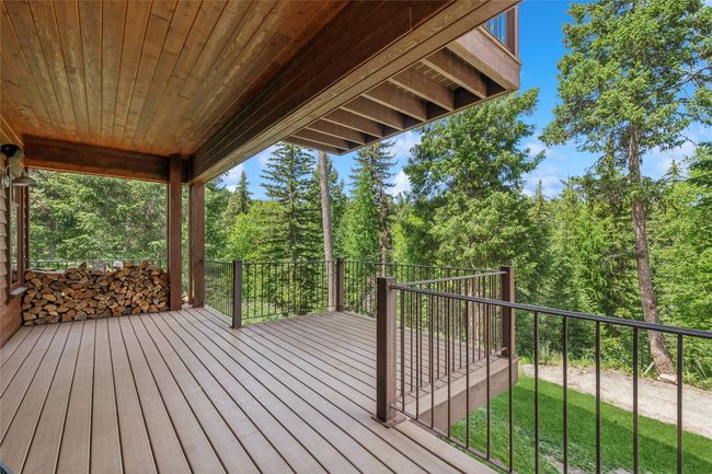 Wooden terrace with a forest view | Image 16