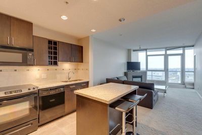 1203 - 77 Spruce Pl Sw, Condo with 2 bedrooms, 2 bathrooms and 1 parking in Calgary AB | Image 1