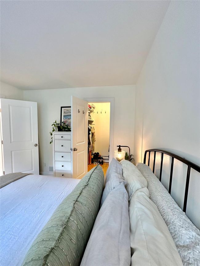 Bedroom featuring a spacious closet | Image 14
