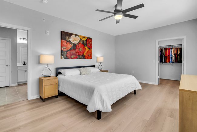 Primary bedroom with attached bath and walk-in closet | Image 15