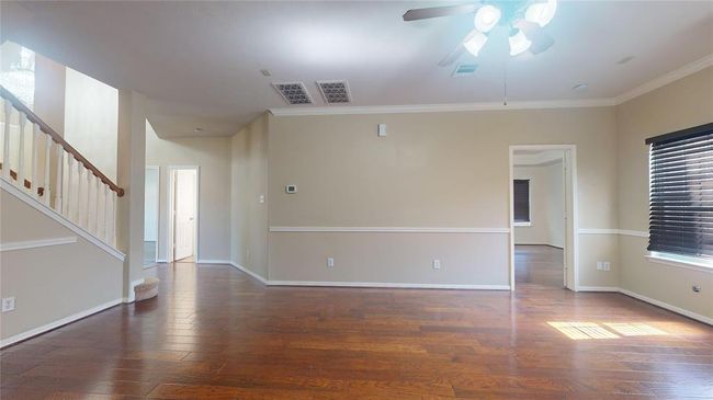 Enjoy seamless flow from the family room to the inviting primary bedroom. | Image 18