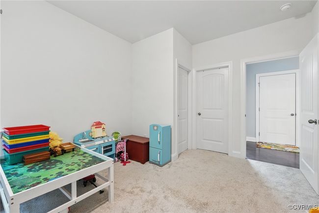 Generous first-floor bedroom—perfect for family, guests, or a home office. | Image 13