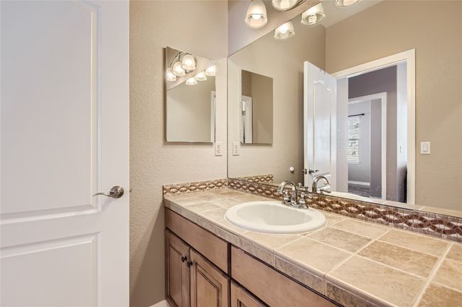 Second Floor Bath of of the Loft with Private Vanity area. Great for getting out the door for yoir daily activities, school or work. | Image 20