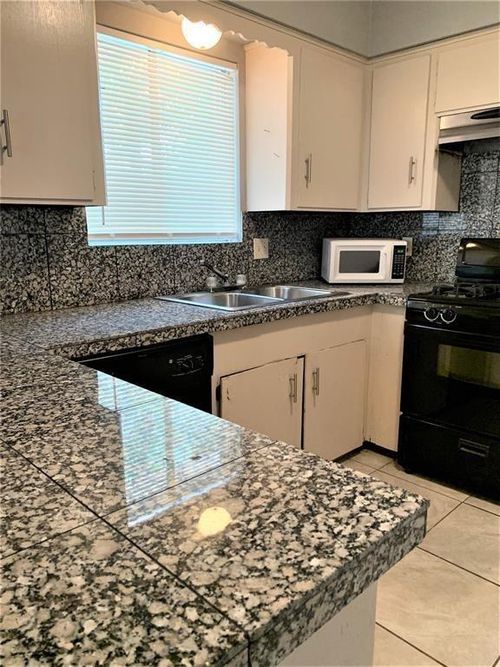 3918 Dalmatian Dr, Houston, TX, 77045-6311 | Card Image