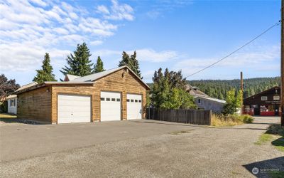 1296 square feet in the detached garage/shop. Asphalt parking area too. | Image 3