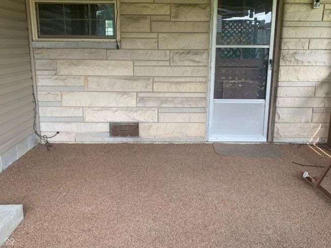View of covered back patio | Image 11