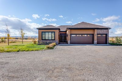 192108 239 Ave W, House detached with 4 bedrooms, 3 bathrooms and 12 parking in Foothills AB | Image 1