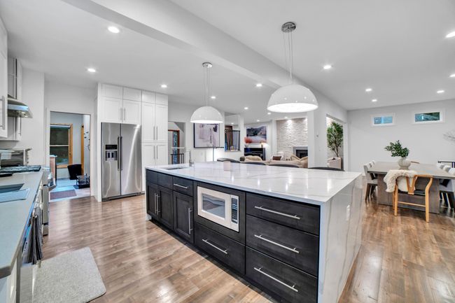 11260 Hidden Oaks Ct N, House other with 5 bedrooms, 4 bathrooms and null parking in Champlin MN | Image 13