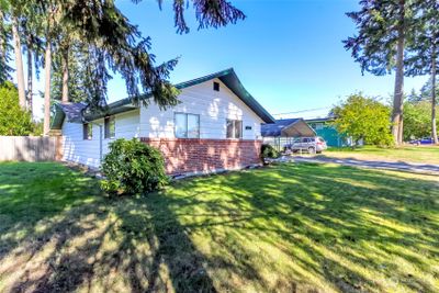 Lush front yard. Nice brick accent and new roof in 2021 | Image 2