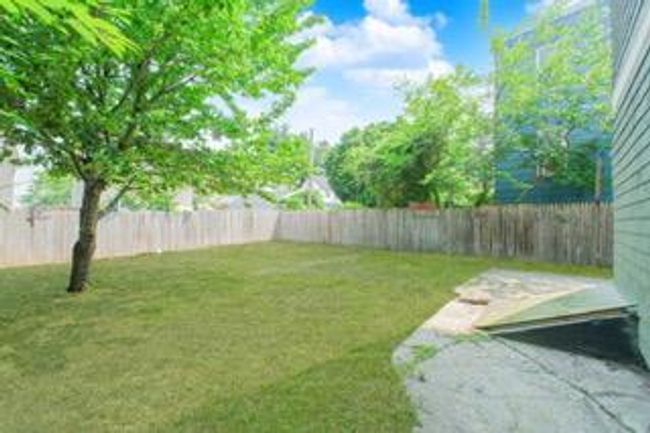 Fenced backyard featuring a patio area | Image 19