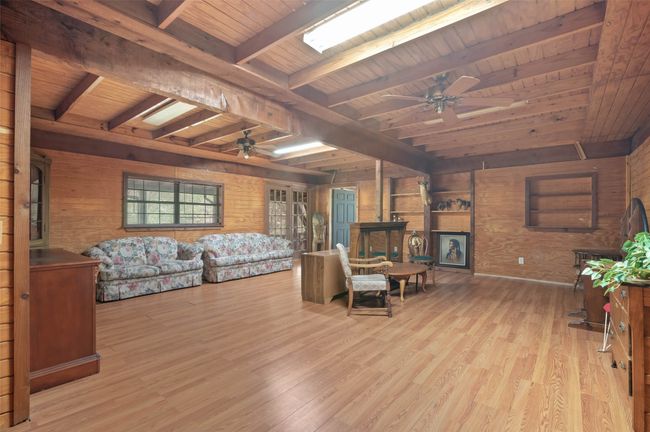 Bring your creative ideas for transforming this space into a 3rd bedroom along with room to keep it as a living space. | Image 17