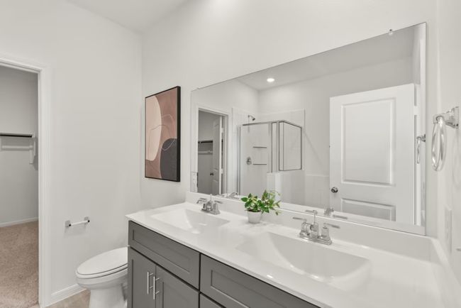 Photo of Pulte model home with same floor plan, not of actual home listed. | Image 13