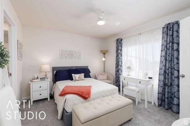 Bedroom featuring carpet floors and ceiling fan | Image 18