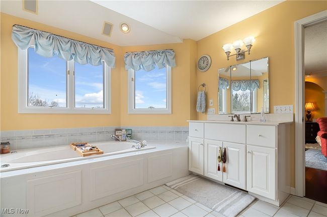 View of the Primary bathroom and wonderful sunken tub. | Image 27