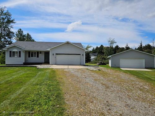 711 Sawyer St, East Tawas, MI, 48730-1225 | Card Image