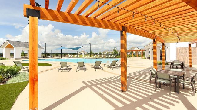 View of patio / terrace featuring a pergola and a community pool | Image 13