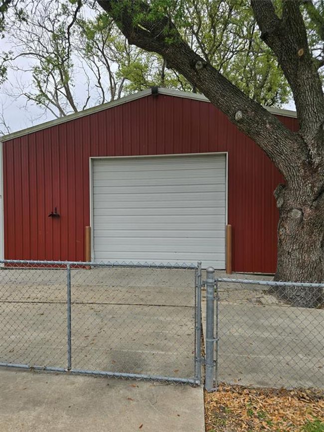 View from cyclone gate in front of barn | Image 43