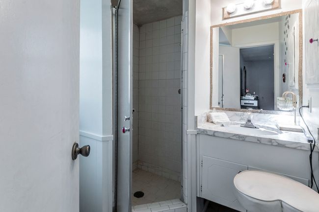 Bathroom featuring vanity, a shower stall | Image 16