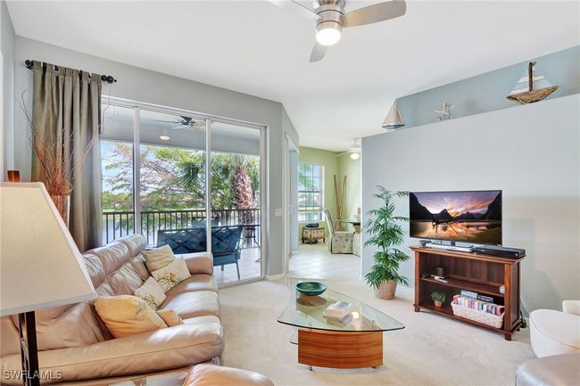 Spacious living room overlooking the lake | Image 9