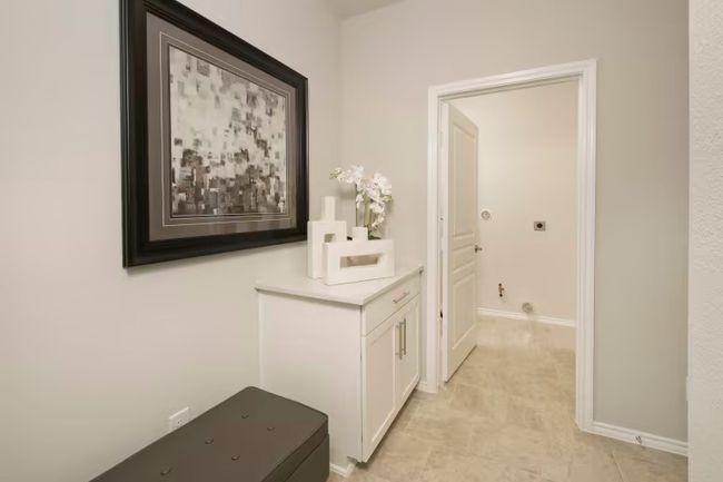 Photo of Pulte model home with same floor plan, not of actual home listed. | Image 10