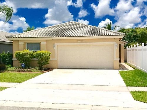 9821 Red Heart Ln, Tamarac, FL, 33321-6323 | Card Image