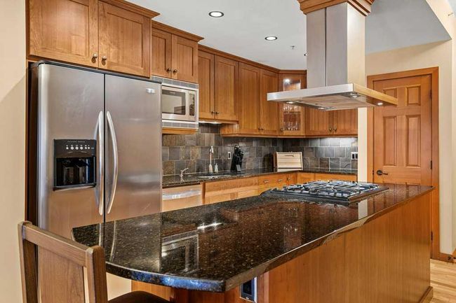 202 - 505 Spring Creek Drive, Condo with 2 bedrooms, 2 bathrooms and 80 parking in Canmore AB | Image 9