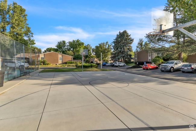 View of concrete road featuring a residential view | Image 28