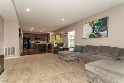 Living room with light carpet | Image 3