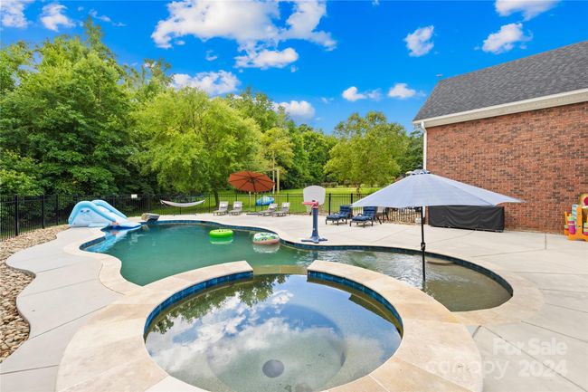 Enjoy the hot summer days swimming in your pool or relaxing in the hot tub. | Image 33