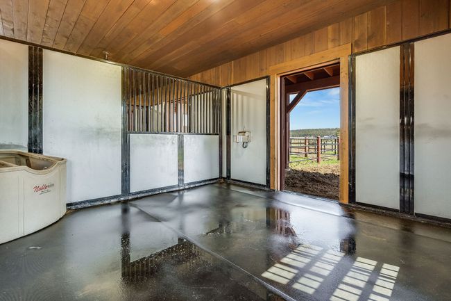 Interior of stall showing custom padded flooring | Image 99