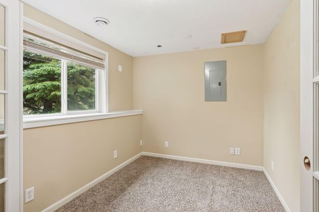 Additional room in lower level. Great office space or playroom | Image 43