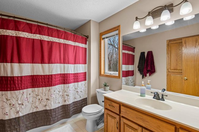 Private primary bath is spacious with window for added natural light | Image 20