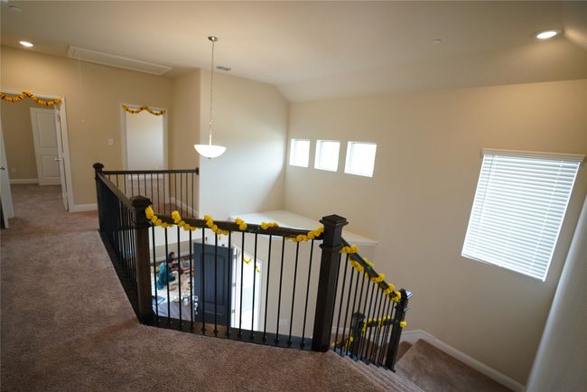 Staircase with attic access, recessed lighting, carpet, and lofted ceiling | Image 18