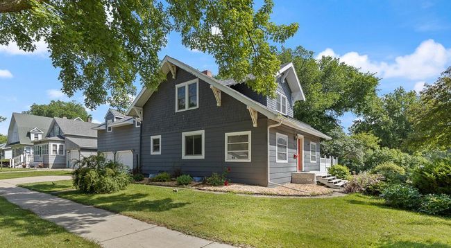 Landscaping surrounds the home | Image 4