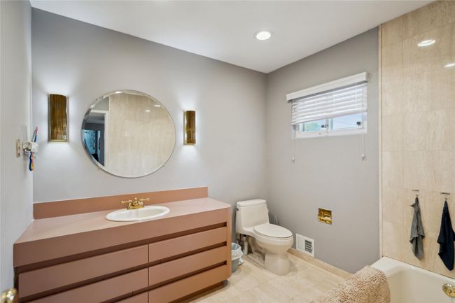 Full bath featuring vanity, tile patterned floors, shower / bath combination, and recessed lighting | Image 8
